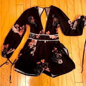 Super sexy romper multicolored made by Blossom.